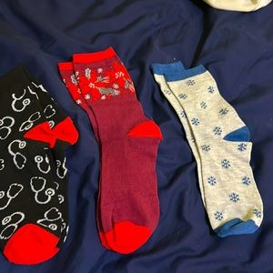 3 pairs of socks Christmas themed.